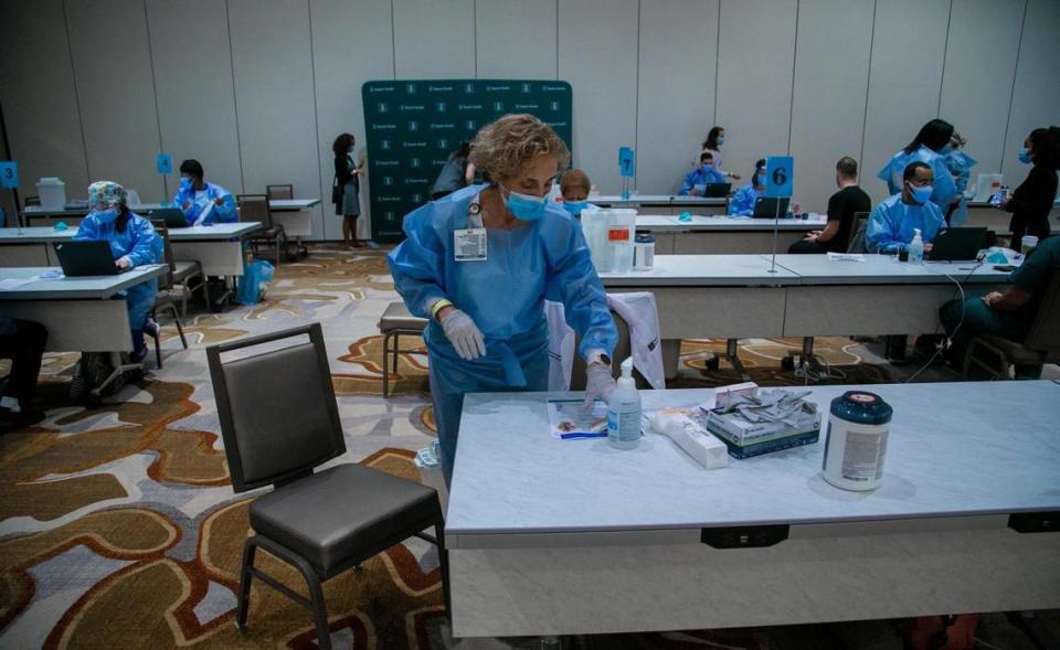 A nurse prepares to start vaccinations at the Hilton Dadeland Hotel next to Baptist Hospital in Kendall in Miami-Dade on Wednesday, Dec. 16, 2020. Baptist Health began administering the first COVID-19 vaccines for their eligible front-line healthcare workers.