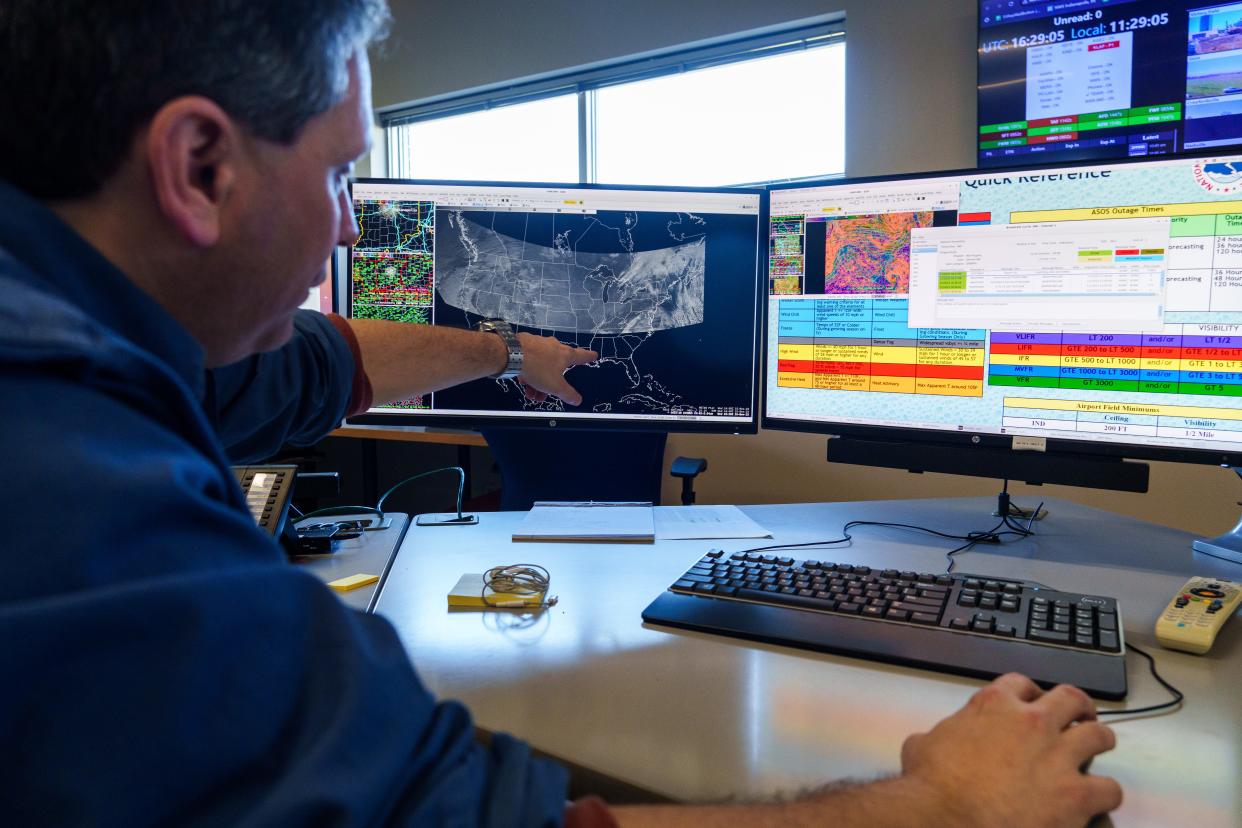Jason Puma, a senior meteorologist, sends out the test of the emergency weather alarm Wednesday, Nov. 15, 2023, at the National Weather Service office in Indianapolis.