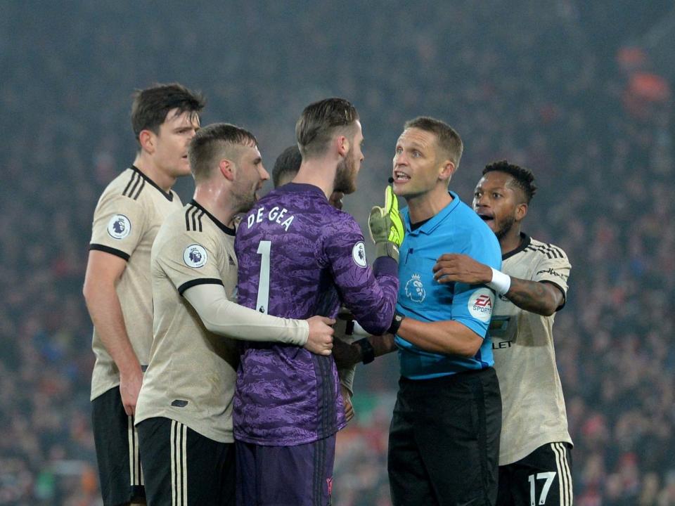 Manchester United's players complain to referee Craig Pawson: EPA
