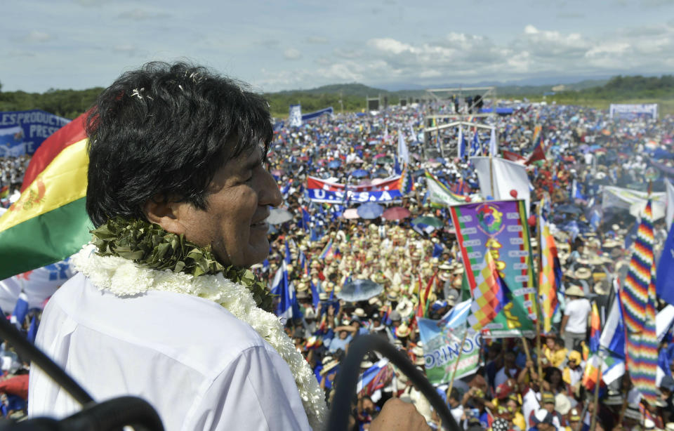 In this handout photo released by the government-run Bolivian Information Agency, Bolivia's President Evo Morales, who is running for re-election with the Movement Toward Socialism, MAS, party, speaks during the opening campaign rally on a runway at the airport in Chimore, Bolivia, Saturday, May 18, 2019. Morales is running for a fourth term. (Freddy Zarco/Bolivian Information Agency via AP)