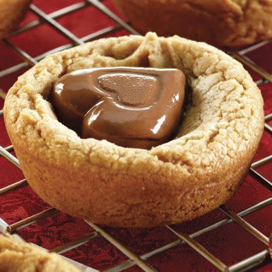 <p>These thumbprint cookies are adorable, tasty, and, best of all, ready in less than 30 minutes.</p><p><em><a href="https://www.womansday.com/food-recipes/food-drinks/recipes/a15702/peanuty-valentine-cookies/" rel="nofollow noopener" target="_blank" data-ylk="slk:Get the Peanutty Valentine Cookies recipe.;elm:context_link;itc:0;sec:content-canvas" class="link ">Get the Peanutty Valentine Cookies recipe.</a></em></p>