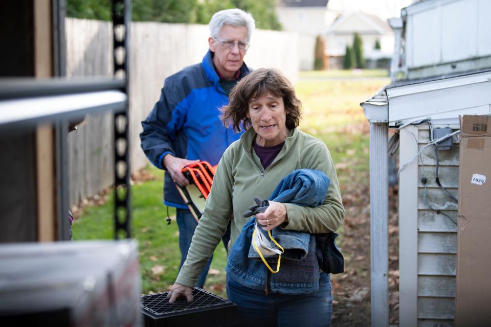 Lisa Pitts of Doylestown volunteers on Giving Tuesday to insulate and stack food shelters at Bucks County Housing Group food pantry in Langhorne on Tuesday, Nov. 29, 2022.