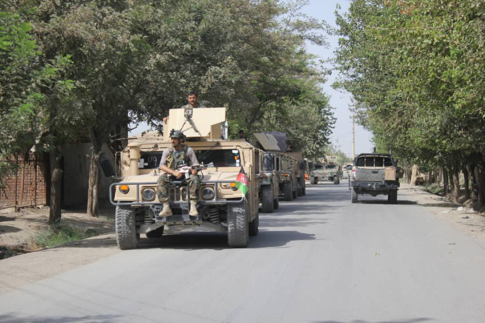 Afghan security forces arrive during a fight against Taliban fighters in Kunduz province north of Kabul, Afghanistan, Saturday, Aug. 31, 2019. The Taliban have launched a new large-scale attack on one of Afghanistan's main cities, Kunduz, and taken hospital patients as hostages, the government said Saturday, even as the insurgent group continued negotiations with the United States on ending America's longest war. (AP Photo/Bashir Khan Safi)