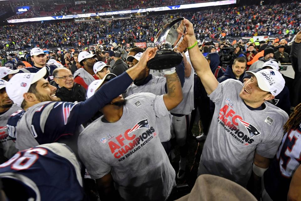 <p>The New England Patriots celebrate with the Lamar Hunt Trophy after beating the Pittsburgh Steelers in the 2017 AFC Championship Game at Gillette Stadium. Mandatory Credit: James Lang-USA TODAY Sports </p>