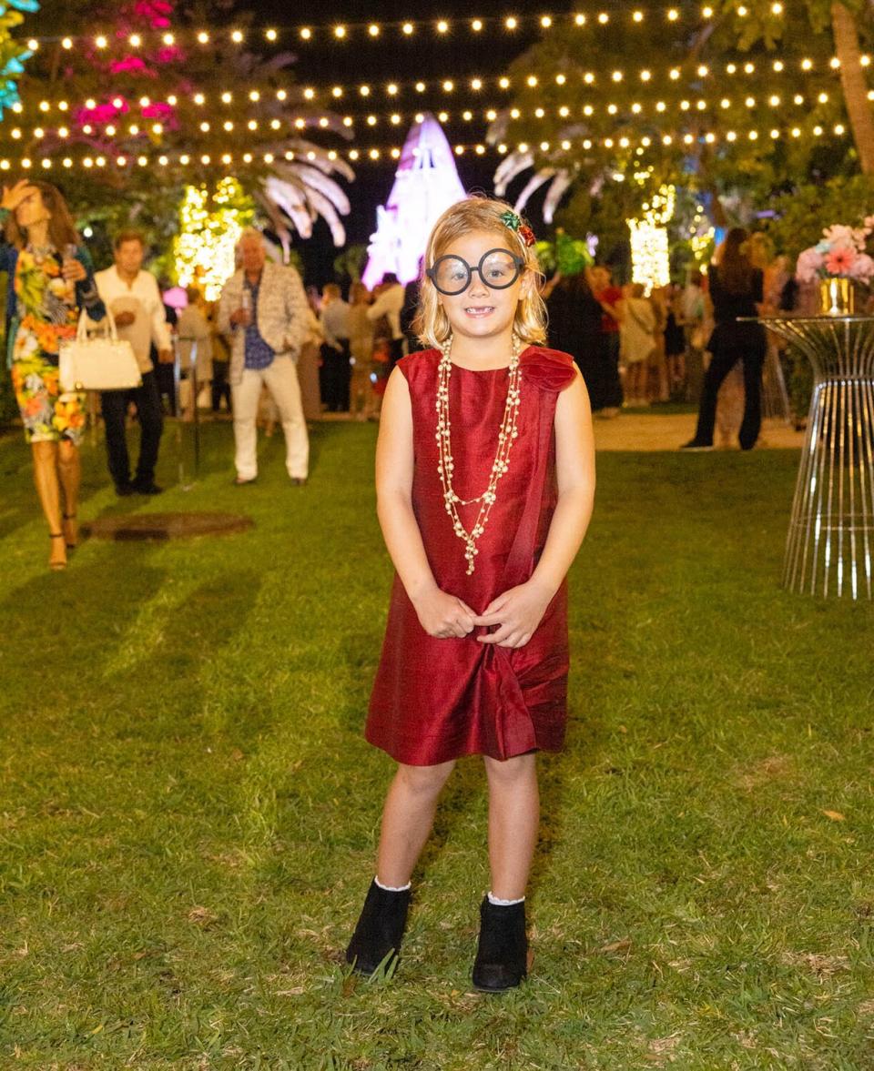 Six-year-old Cora Cooke at Iris Apfel's christmas tree lighting event