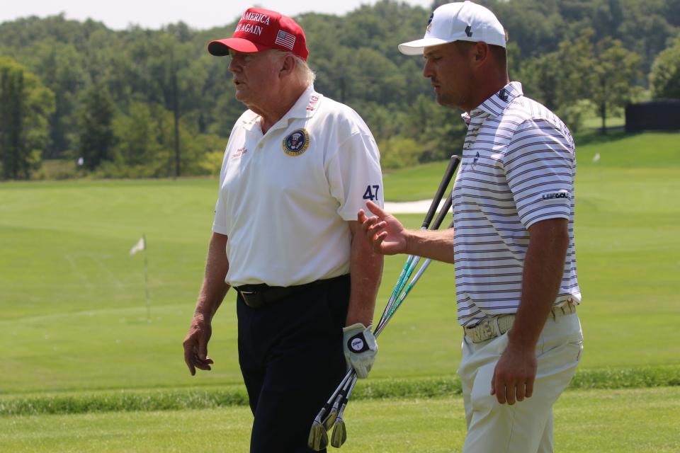 Bedminster, NJ August 9, 2023 -- Former President Donald Trump on the driving range as he played at Trump National in Bedminster before the weekend’s LIV Golf Tournament.