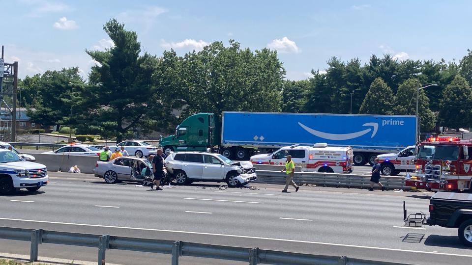 At least one person is dead and four others are injured following a four-vehicle crash on I-295 Friday afternoon.