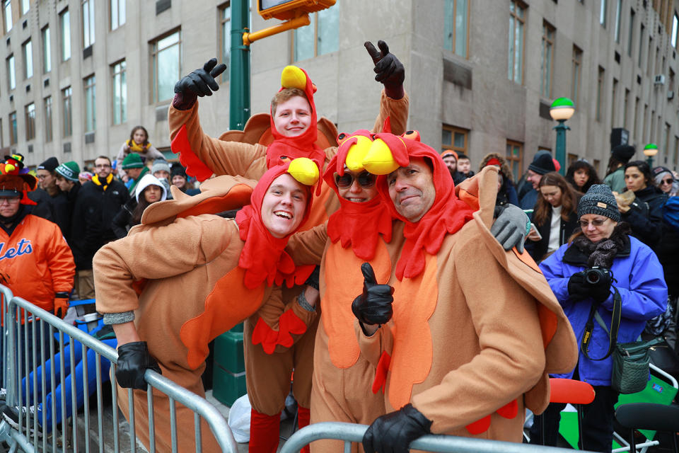 Spectators dressed in their turkey days best await the start of the 93rd Macy's Thanksgiving Day Parade.(Photo: Gordon Donovan/Yahoo News)