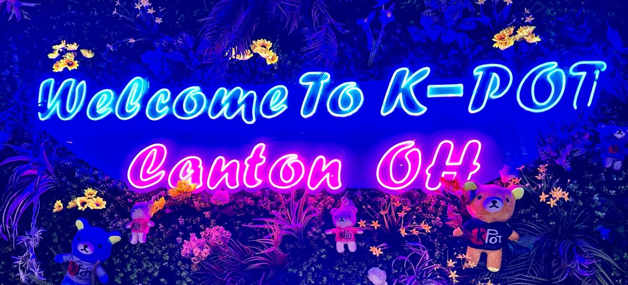 A colorful and decorative welcome sign greets you upon entering KPOT.