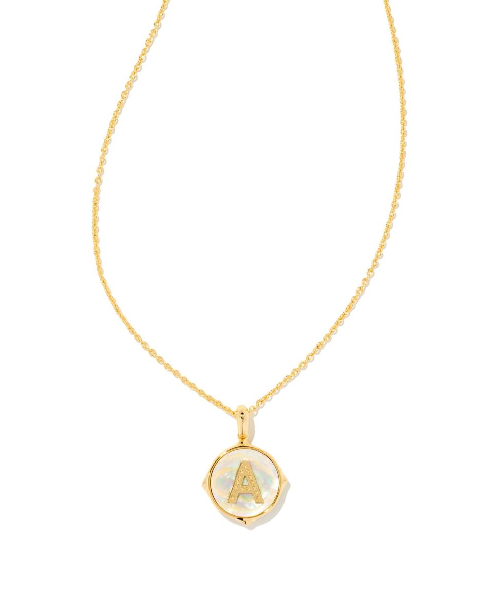 <p><a href="https://go.redirectingat.com?id=74968X1596630&url=https%3A%2F%2Fwww.kendrascott.com%2Fcollections%2Fvacation-edit%2Fletter-a-gold-disc-reversible-pendant-necklace-in-iridescent-abalone%2F196088023809.html&sref=https%3A%2F%2F" rel="nofollow noopener" target="_blank" data-ylk="slk:Shop Now;elm:context_link;itc:0;sec:content-canvas" class="link ">Shop Now</a></p><p>Letter Reversible Pendant Necklace in Iridescent Abalone</p><p>kendrascott.com</p><p>$80.00</p>