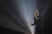 Chris Martin of Coldplay performs a tribute to George Michael at the Brit Awards at the O2 Arena in London, Britain, February 22, 2017. REUTERS/Toby Melville