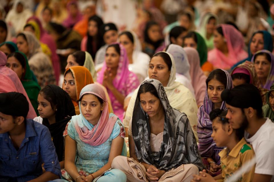 Worshipers gather in the prayer room at the Sikh temple in Oak Creek August 12, 2012.