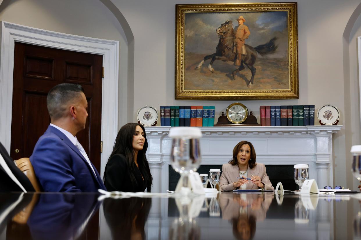 Kim Kardashian, center, joins Vice President Kamala Harris and Jason Hernandez during a roundtable discussion on criminal justice reform.