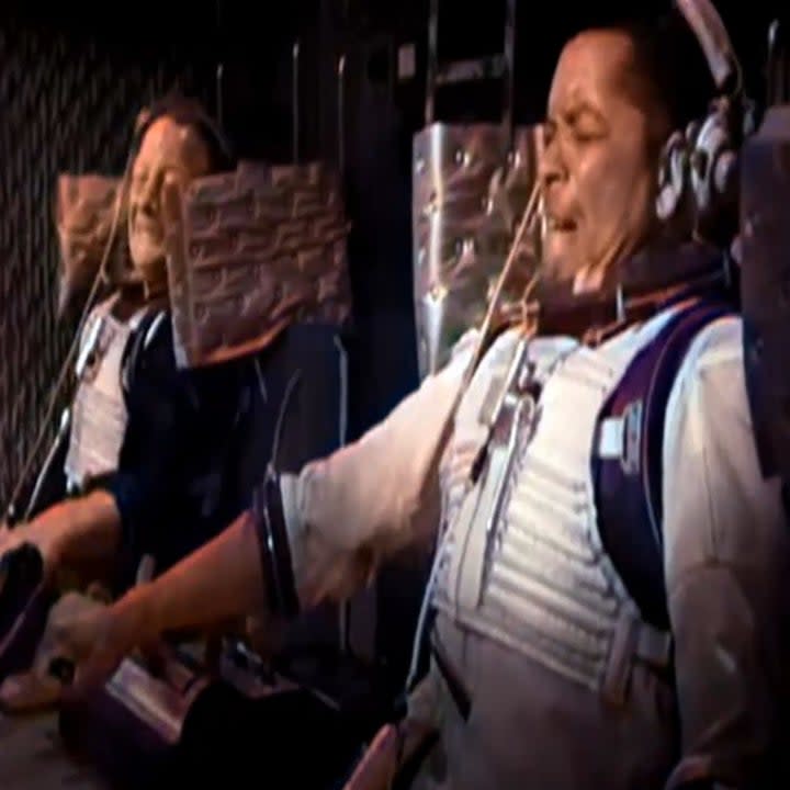 Two astronauts wearing white tactical vests in Doctor Who