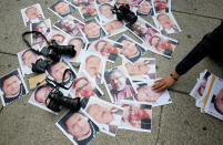 <p>Pictures of journalists who have been killed in Mexico are seen during a demonstration against the murder of journalist Javier Valdez, at the Angel of Independence monument in Mexico City, Mexico on May 16, 2017. (Henry Romero/Reuters) </p>