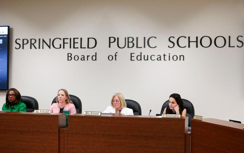 Springfield school board president Danielle Kincaid, vice president Judy Brunner and member Maryam Mohammadkhani take their seats after the swearing-in ceremony Tuesday.