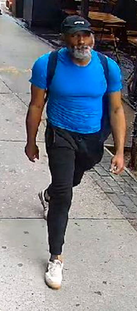 A man wanted for assaulting Steve Buscemi in a surveillance image released by the NYPD. DCPI