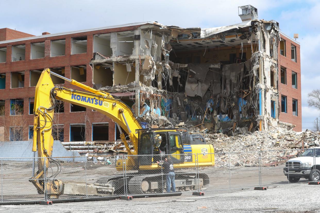 A demolition crew from Eslich Wrecking works Wednesday at the former Akron Baptist Temple at 2324 Manchester Road.