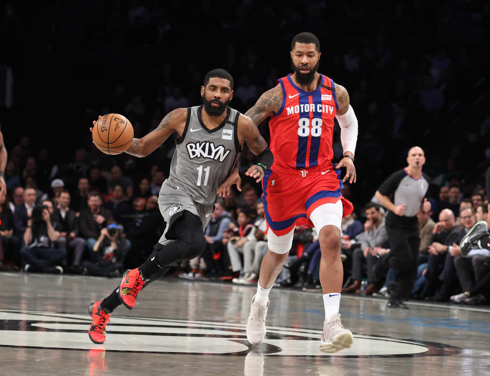 NEW YORK, NEW YORK - JANUARY 29:  Kyrie Irving #11 of the Brooklyn Nets drives against Markieff Morris #88 of the Detroit Pistons during their game at Barclays Center on January 29, 2020 in New York City.   NOTE TO USER: User expressly acknowledges and agrees that, by downloading and/or using this photograph, user is consenting to the terms and conditions of the Getty Images License Agreement.  (Photo by Al Bello/Getty Images)