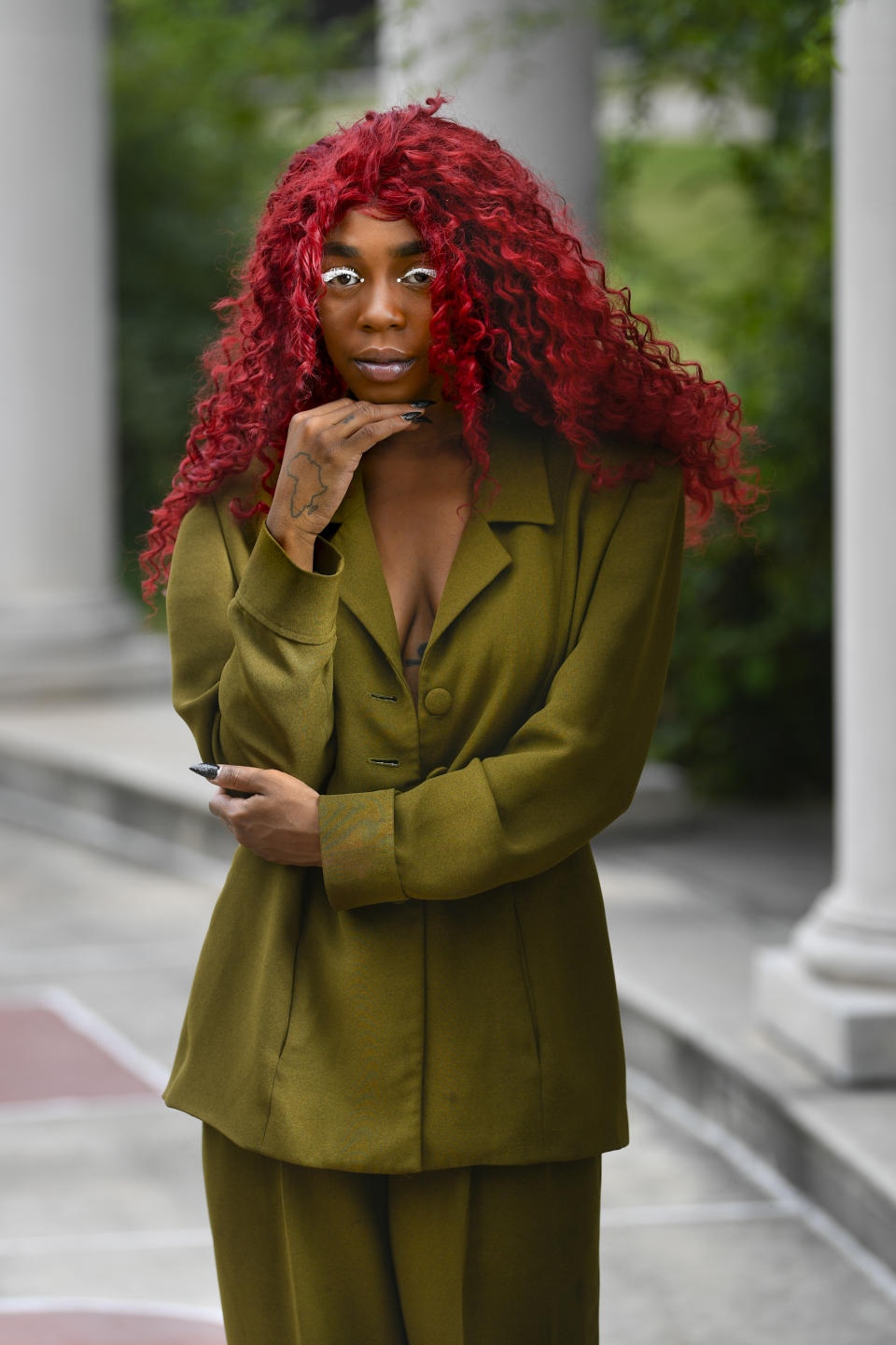 This Aug. 19, 2019 photo shows music artist Buku Abi, born Joann Kelly, posing in Atlanta. As the daughter of R. Kelly, she experienced her fair share of hardships. She is no longer in touch with him and says being R. Kelly’s daughter is like “a double-edged sword.” In March, Abi released her debut EP “Don’t Call Me” and she appeared on the WEtv reality series, “Growing Up Hip Hop: Atlanta.” (AP Photo/John Amis)