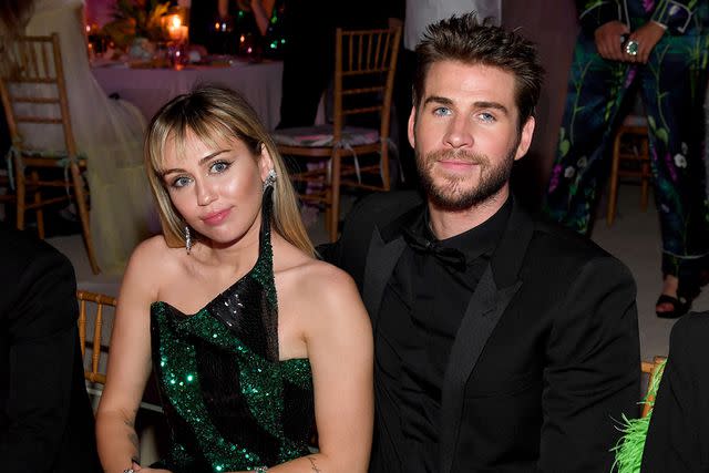 <p>Kevin Mazur/MG19/Getty</p> Miley Cyrus and Liam Hemsworth in 2019