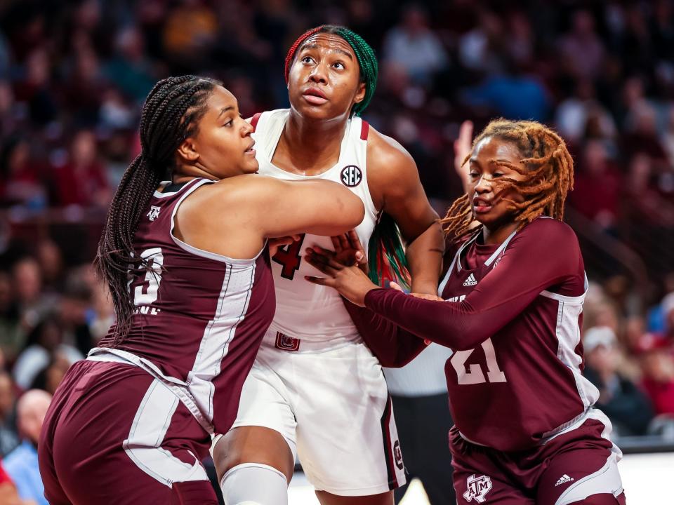 Aliyah Boston is double-teamed against Texas A&M.