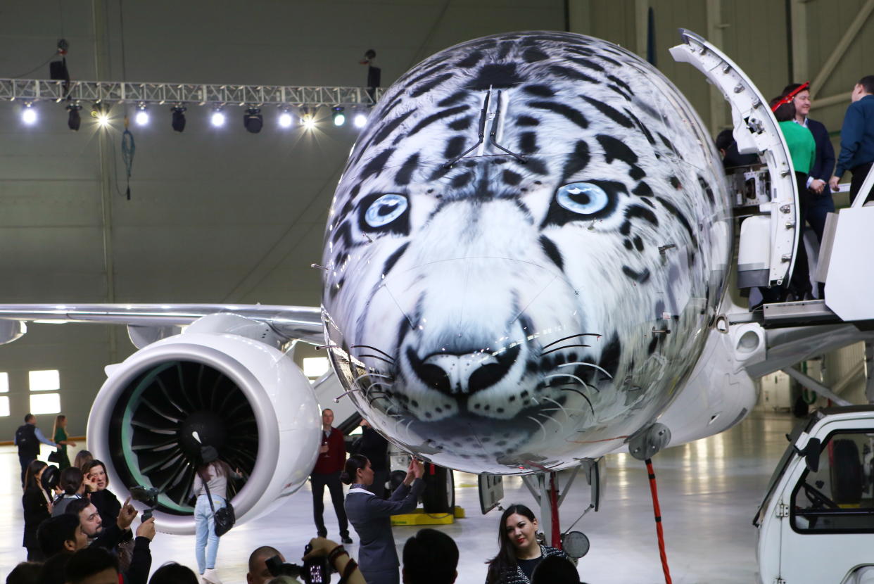 A new plane depicting a snow leopard’s snout on the fuselage nose. (Photo: Marina Lystseva/TASS via Getty Images)
