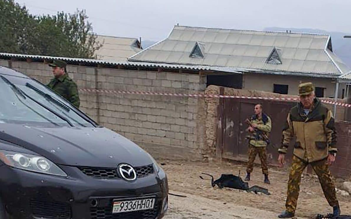 Tajik security forces killed 15 assailants when an armed gang attacked a checkpoint on the border with Uzbekistan - AFP