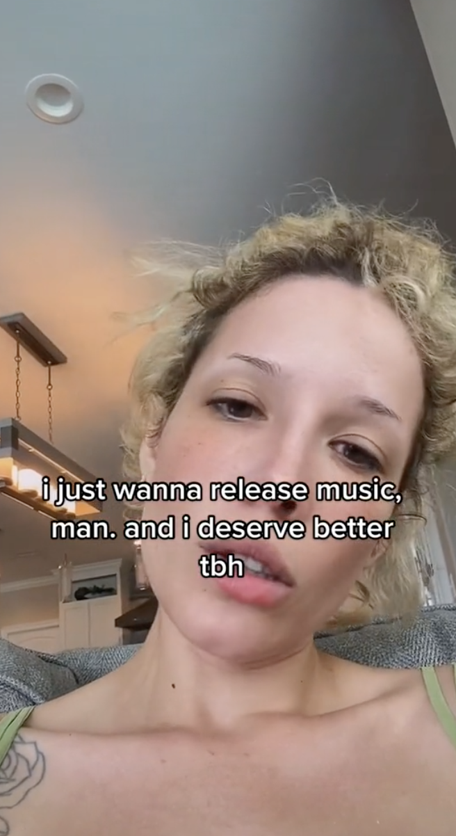 Closeup of Halsey on TikTok with text that reads, "i just wanna release music, man. and i deserve better tbh"