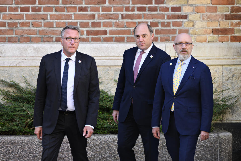 From left, Denmark's Defense Minister Morten Boedskov, Britain's Defense Minister Ben Wallace and Ukraine's Defense Minister Oleksii Reznikov arrive at the donor conference for Ukraine, in Copenhagen, Thursday, Aug. 11, 2022. The international donation conference will strengthen the long-term support for Ukraine with discussions on how financing, weapons production, training and demining can be strengthened going forward. (Philip Davali/Ritzau Scanpix via AP)