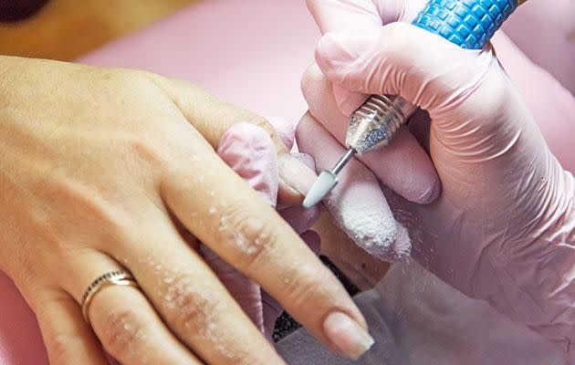 A woman just finished a course to become a nail technician. Photo: Getty