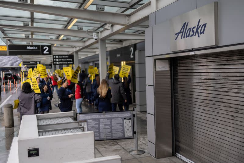FILE PHOTO: Alaska Airlines flight attendants protest at San Francisco airport to push for landmark changes in new contracts