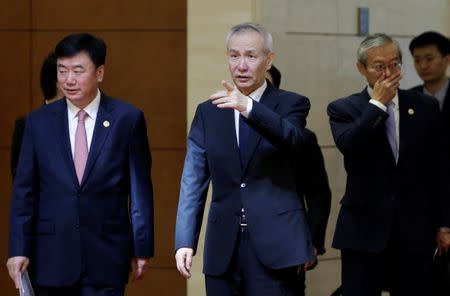 Chinese Vice Premier Liu He (C) arrives for the EU-China High-level Economic Dialogue at Diaoyutai State Guesthouse in Beijing, China, June 25, 2018. REUTERS/Jason Lee