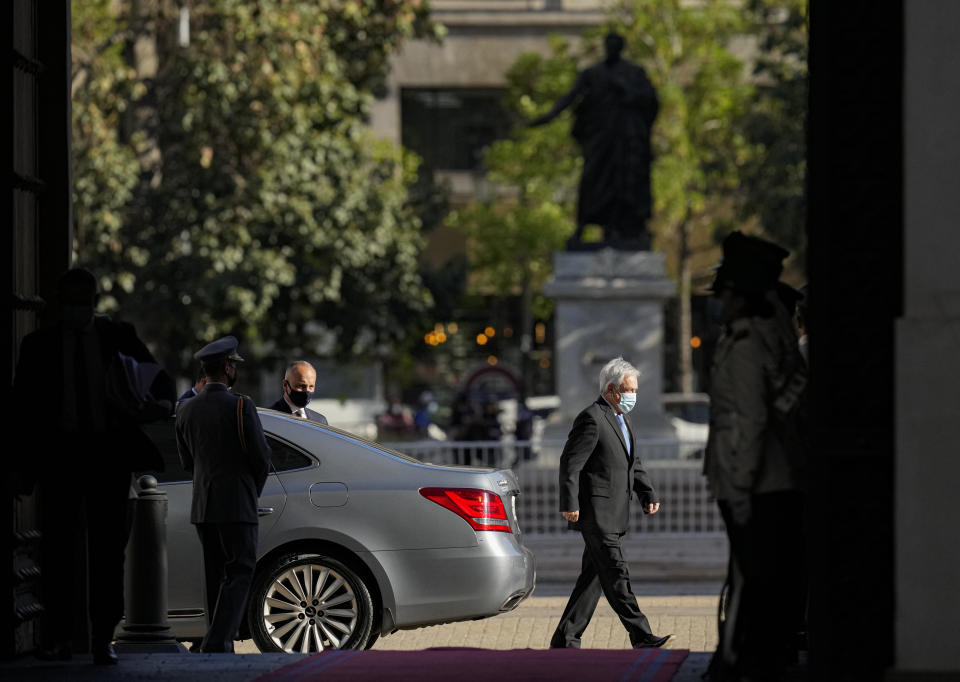 Chilean President Sebastian Piñera arrives at La Moneda presidential palace in Santiago, Chile, Monday, Nov. 8, 2021. (AP Photo/Esteban Felix)