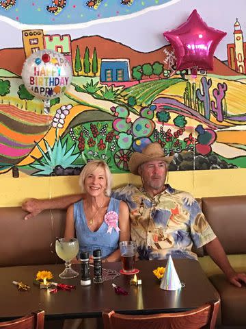 <p>Courtesy Nick Buro and Bryan Hendry</p> Kathy Brandel and Ralph Hendry in a restaurant.