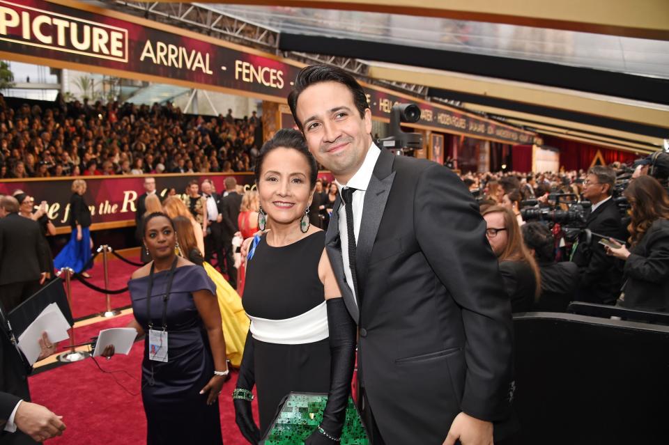 Lin-Manuel Miranda (R) and his mother Luz Towns-Miranda (L) attend the 89th Annual Academy Awards at Hollywood & Highland Center on February 26, 2017