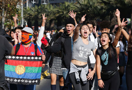 Demonstrators take part in a protest demanding an end to profiteering in the education system in Santiago, Chile April 19, 2018. REUTERS/Rodrigo Garrido