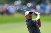 ORLANDO, FL - MARCH 24: Tiger Woods of the USA plays his second shot at the par 4, 1st hole during the third round of the 2012 Arnold Palmer Invitational presented by MasterCard at Bay Hill Club and Lodge on March 24, 2012 in Orlando, Florida. (Photo by David Cannon/Getty Images)