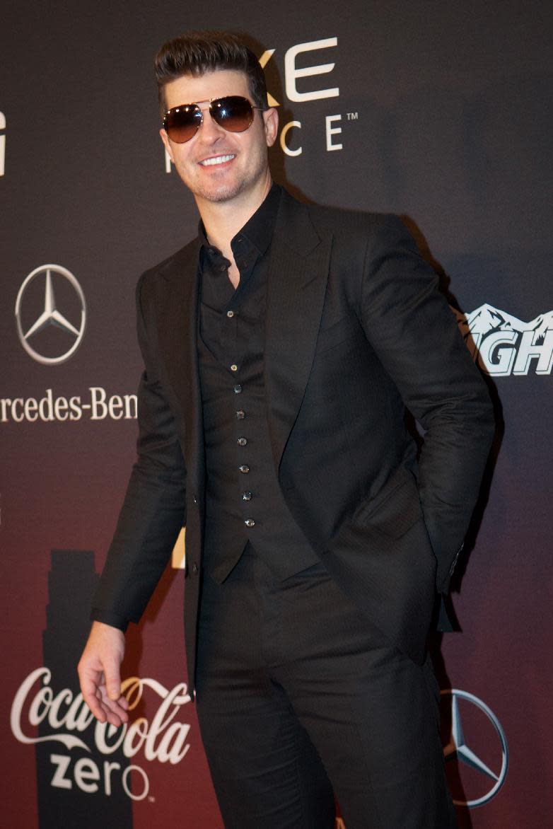 Robin Thicke attends at ESPN The Party, on Friday, Jan., 31, 2014 in New York. (Photo by Scott Roth/Invision/AP)
