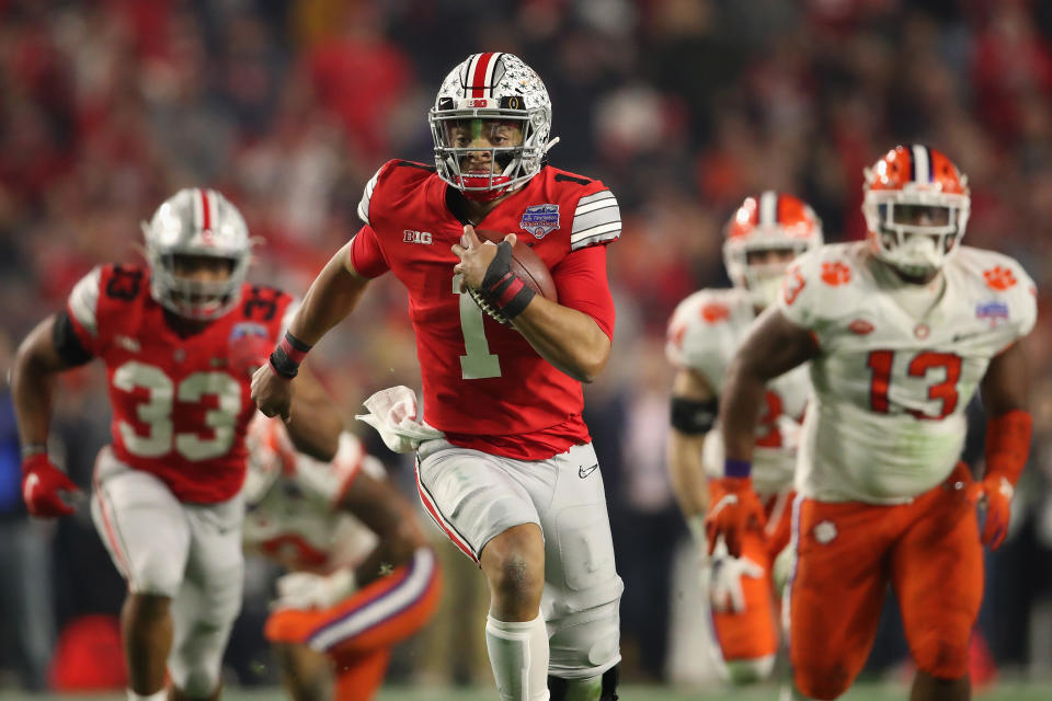 Justin Fields scrambles with the football during the Fiesta Bowl.