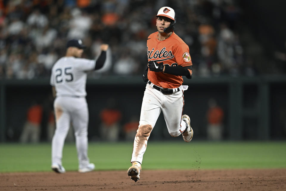 Baltimore Orioles' Ramon Urias runs the bases after hitting a two-run home run against the New York Yankees during the eighth inning of a baseball game Saturday, July 23, 2022, in Baltimore. The Orioles won 6-3. (AP Photo/Gail Burton)