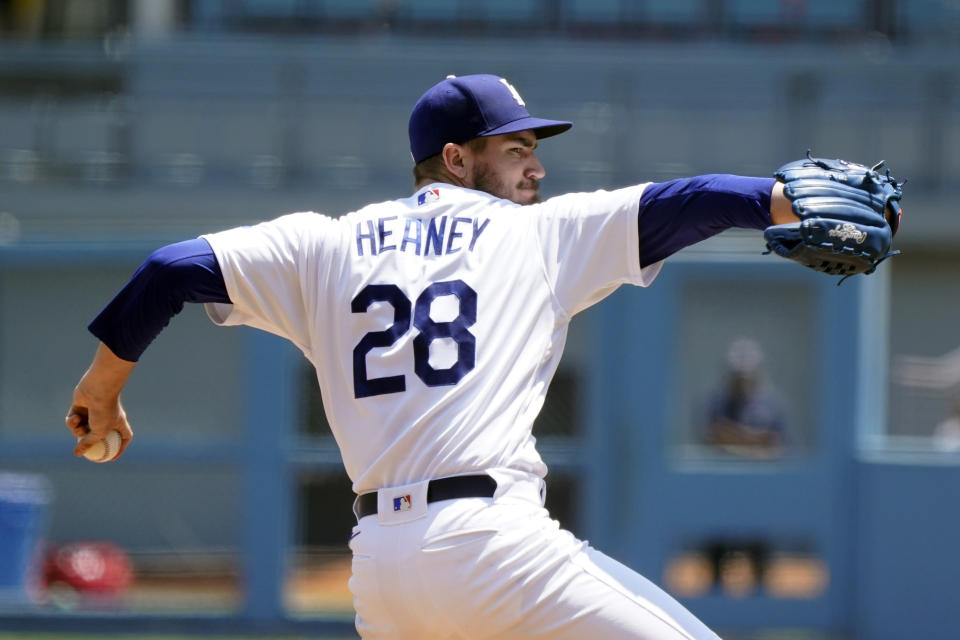 Los Angeles Dodgers starter Andrew Heaney throws to a Washington Nationals batter during the first inning of a baseball game Wednesday, July 27, 2022, in Los Angeles. (AP Photo/Marcio Jose Sanchez)