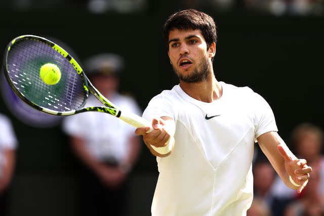 <p>Julian Finney/Getty Images</p> Carlos Alcaraz of Spain plays during the men's singles finals against Novak Djokovic of Serbia at the Wimbledon Championship 2023.
