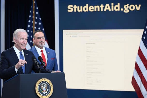 PHOTO: Education Secretary Miguel Cardona looks on as President Joe Biden delivers remarks on the student debt relief portal beta test, in the South Court Auditorium of the Eisenhower Executive Office Building in Washington, D.C., Oct. 17, 2022.  (Brendan Smialowski/AFP via Getty Images)