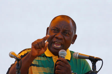 FILE PHOTO: African National Congress (ANC) President Cyril Ramaphosa addresses supporters during the Congress' 106th anniversary celebrations, in East London, South Africa, January 13, 2018. REUTERS/Siphiwe Sibeko/File Photo
