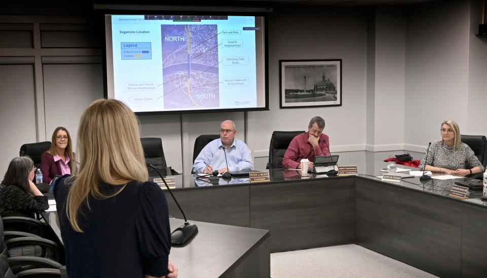 At a meeting in Bourne on March 21, Jill McLaughlin of Mass DOT shows alternate visions of the Sagamore bridge during the Bourne selectman meeting Tuesday evening. The selectmen are (from left) Mary Jane Mastrangelo, Peter J. Meier (chairman) , Jared P. MacDonald and Judith MacLeod Froman.