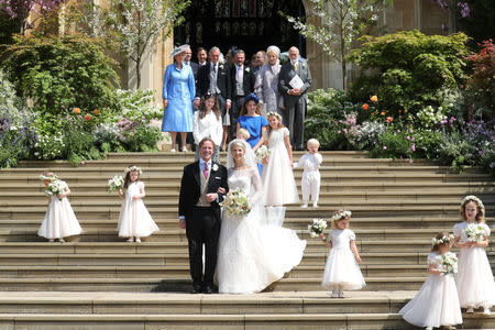 Newlyweds Mr Thomas Kingston and Lady Gabriella Windsor pose on the steps of the chapel with their bridesmaids, page boys and guests after their wedding at St George's Chapel in Windsor Castle, near London, Britain May 18, 2019. Chris Jackson/Pool via REUTERS