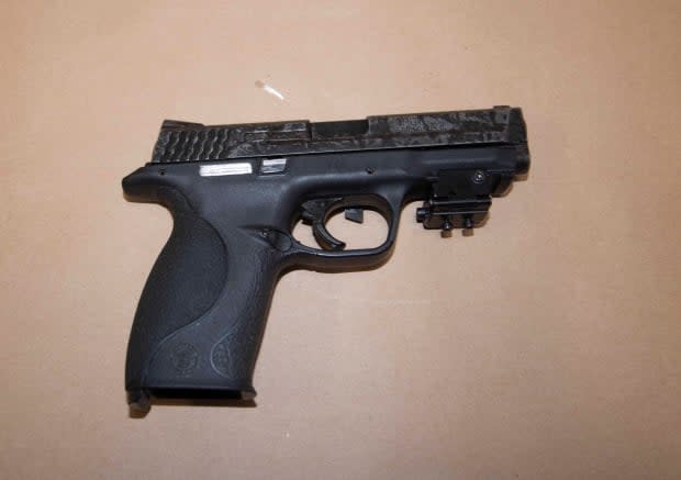 Halifax police say they seized this handgun during the arrest of Andrew Jason Hudder, 34, on Saturday. (Halifax Regional Police - image credit)