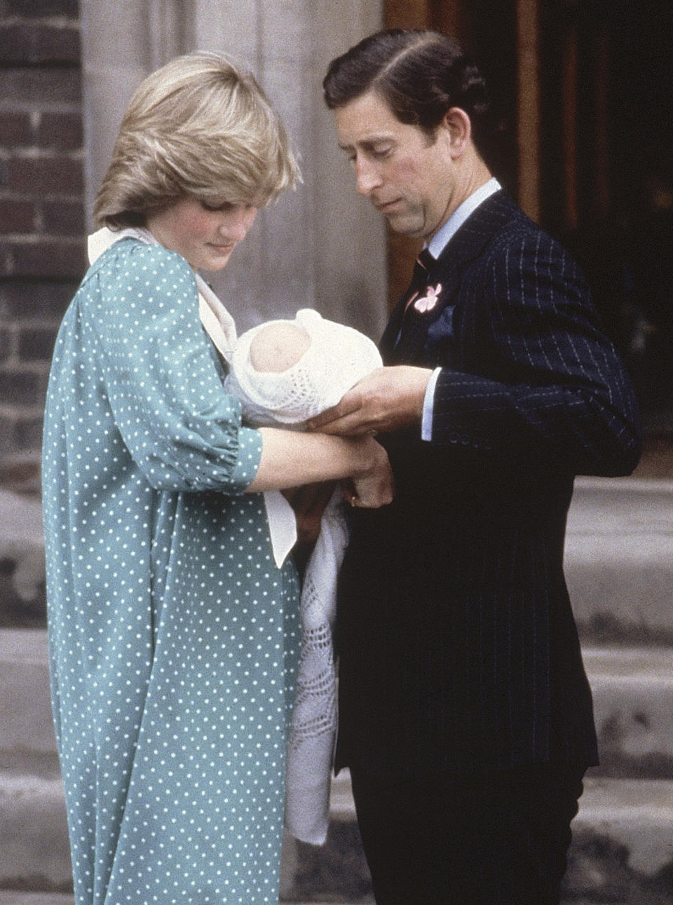 FILE - In this June 22, 1982 file photo Britain's Prince Charles, Prince of Wales, with his wife Princess Diana taking their newborn son Prince William, as they left St. Mary's Hospital, Paddington, London. William, the Duke and and Kate, Duchess of Cambridge are very pleased to announce that the Duchess of Cambridge is expecting a baby, St James's Palace officially announced Monday Dec. 3, 2012.  (AP Photo/John Redman, File)