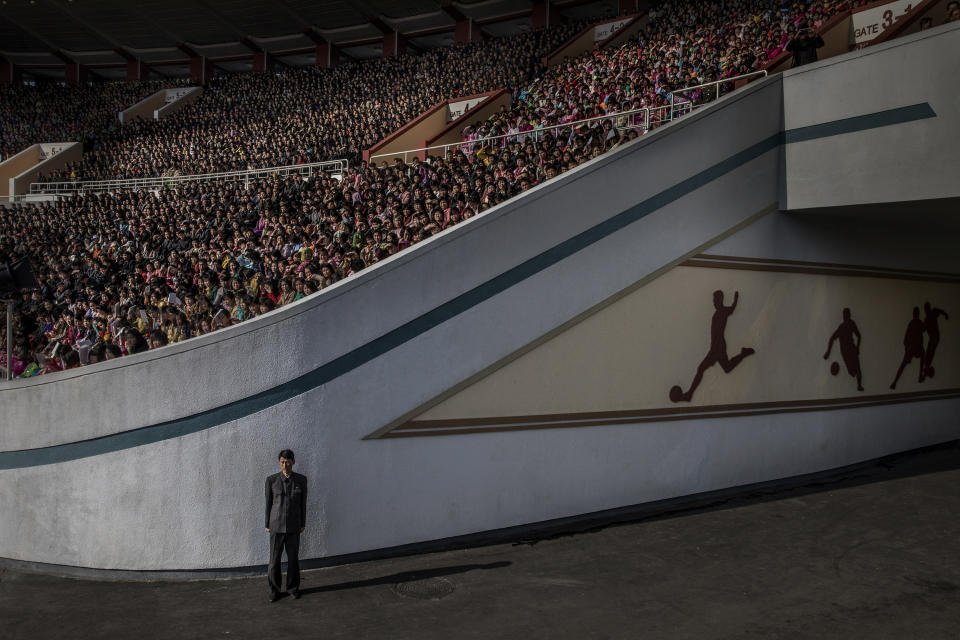 <p>North Korea: A huge crowd at the Kim Il Sung stadium awaits the start of the Pyongyang marathon. An official guards the exit in Pyongyang, North Korea, April 9, 2017.<br>More than 50,000 spectators assembled to see the start of the marathon. Thousands more gathered on the streets of the North Korean capital along a route that took runners past such landmarks as the Arch of Triumph, Kim Il-sung Square and the Grand Theatre. North Korea is one of the most isolated and secretive nations on earth. A leadership cult has grown around the Kim dynasty, passing from Kim Il-sung (the Great Leader) to his son Kim Jong-il (the Dear Leader) and grandson, the current supreme leader Kim Jong-un. The country is run along rigidly state-controlled lines. Local media are strictly regulated, and the foreign press largely excluded, or, if allowed access closely accompanied by minders. (Photo: Roger Turesson, Dagens Nyheter) </p>